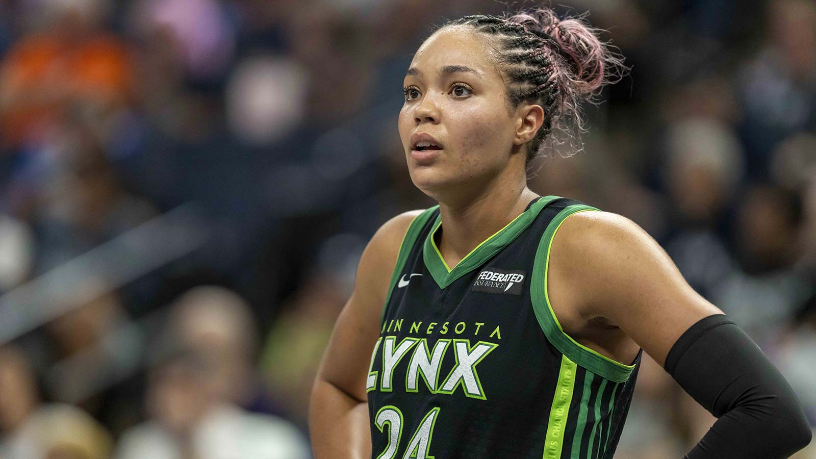 Minnesota Lynx forward Napheesa Collier (24) looks on against the Golden State Valkyries in the second half during game one of round one for the 2025 WNBA Playoffs at Target Center.