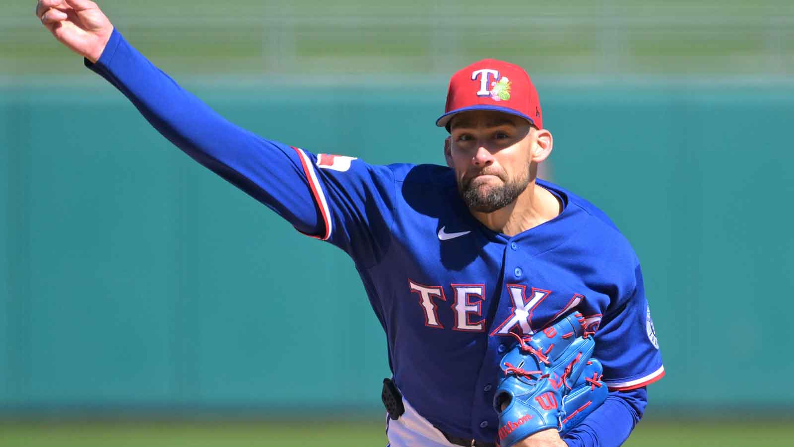 Rangers’ Nathan Eovaldi reacts after giving up 2 home runs in spring training debut