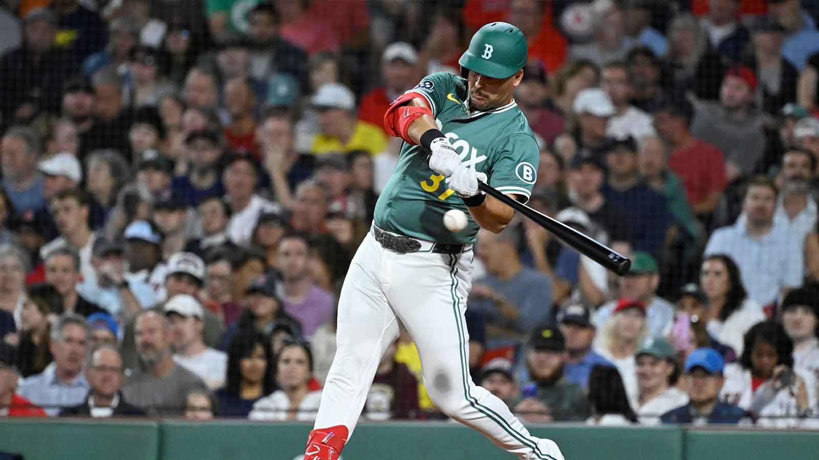 Boston Red Sox first baseman Nathaniel Lowe (37) hits a double against the Detroit Tigers during the second inning at Fenway Park.