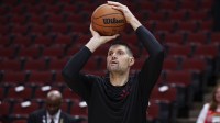 Chicago Bulls center Nikola Vucevic (9) warms up before a basketball game against the Boston Celtics at United Center.