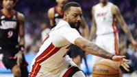 Miami Heat guard Norman Powell (24) reaches for a loose ball against the Philadelphia 76ers during the second quarter at Xfinity Mobile Arena.