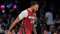 Miami Heat guard Norman Powell (24) reacts against the Phoenix Suns during the third quarter at Kaseya Center.