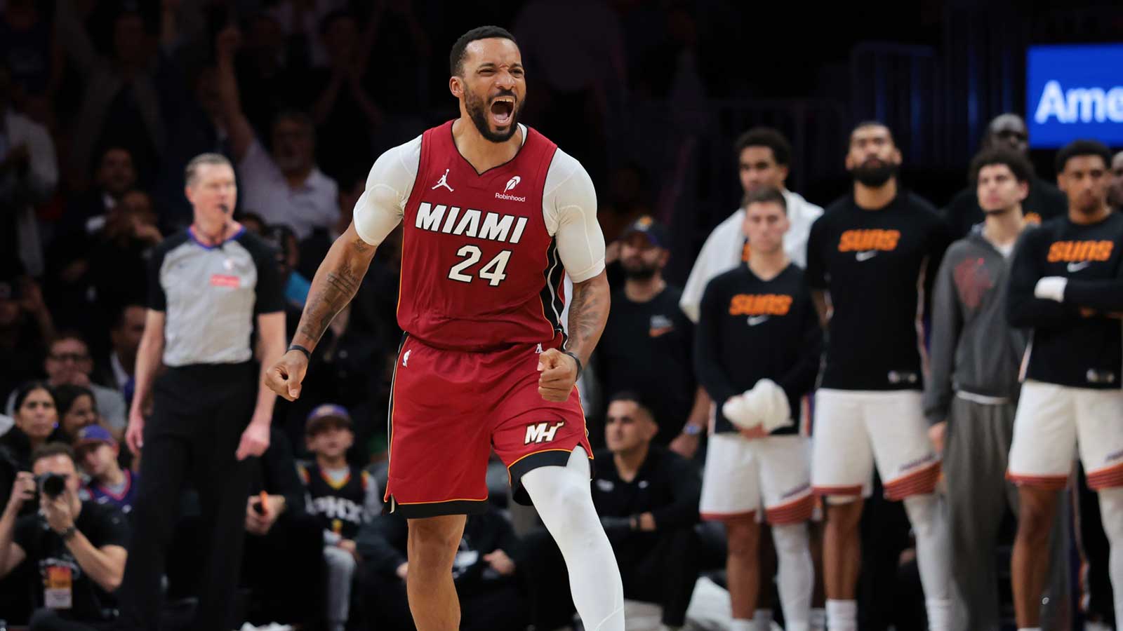 Miami Heat guard Norman Powell (24) reacts after scoring against the Phoenix Suns during the fourth quarter at Kaseya Center.