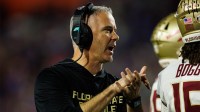 Florida State Seminoles head coach Mike Norvell gestures against the Florida Gators during the second half at Ben Hill Griffin Stadium.