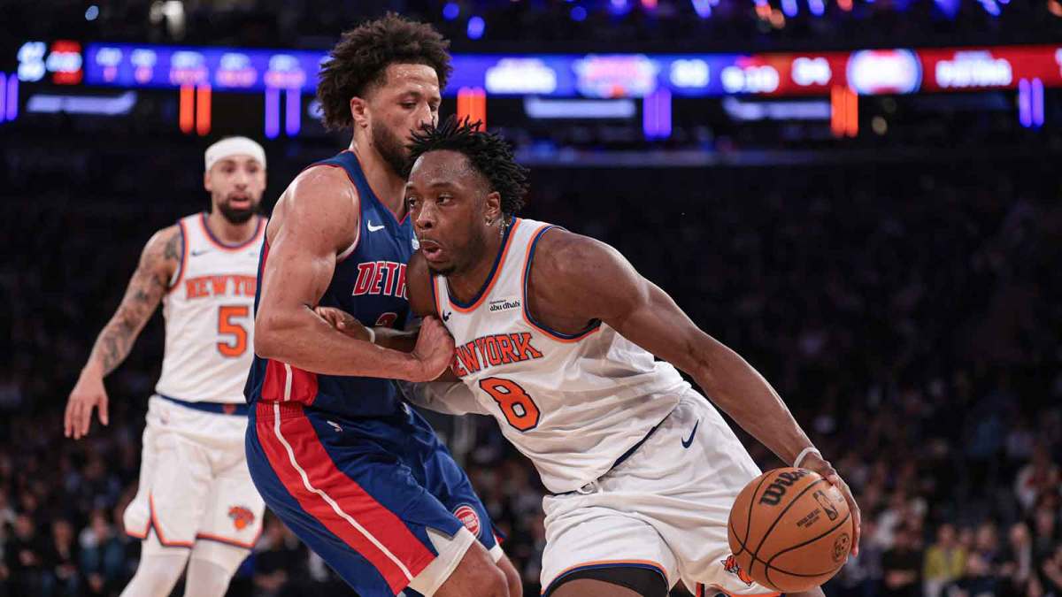 New York Knicks forward Og Anunoby (8) drives to the basket against Detroit Pistons guard Cade Cunningham (2) during the first half at Madison Square Garden.