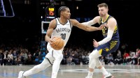 Brooklyn Nets guard Ochai Agbaji (30) drives to the basket against Indiana Pacers center Micah Potter (11) during the second quarter at Barclays Center.