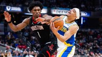 Pacers' Andrew Nembhard is fouled by Rockets' Amen Thompson