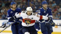 Florida Panthers center Aleksander Barkov (16) gets ahead of Tampa Bay Lightning center Anthony Cirelli (71) and right wing Alexander Volkov (79) during the third period of a hockey game at Amalie Arena.