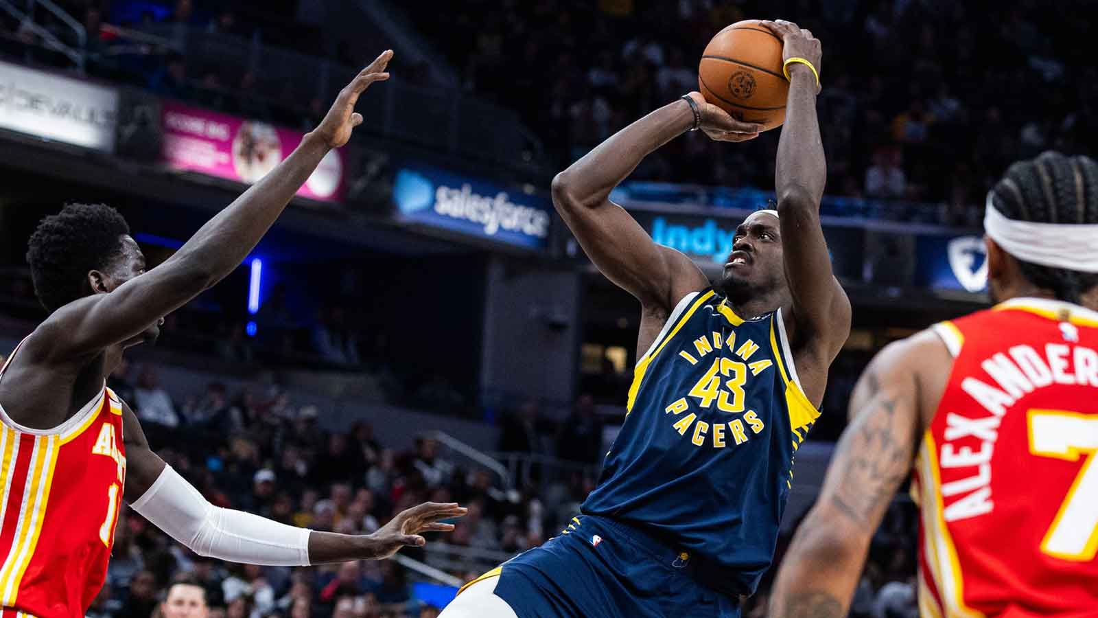 Indiana Pacers forward Pascal Siakam (43) shoots the ball while Atlanta Hawks forward Mouhamed Gueye (18) defends in the first half at Gainbridge Fieldhouse.