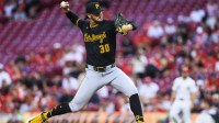 Pittsburgh Pirates starting pitcher Paul Skenes (30) pitches against the Cincinnati Reds in the first inning at Great American Ball Park.