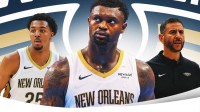 Zion Williamson in the middle, Coach James Borrego and Trey Murphy III around him, New Orleans Pelicans wallpaper in the background