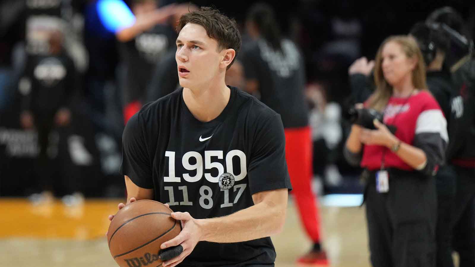 Miami Heat guard Pelle Larson (9) warms up before the start of the game against the Chicago Bulls at the Cassia Center. 