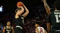Miami RedHawks guard Peter Suder (5) hits a jump shot in the second half of the NCAA Basketball game at Millett Hall in Oxford.
