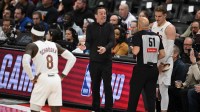Cleveland Cavaliers head coach Kenny Atkinson argues with an official during their game against the Detroit Pistons in the first half at Little Caesars Arena. Mandatory Credit: Lon Horwedel-Imagn Images