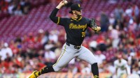 Pittsburgh Pirates starting pitcher Paul Skenes (30) pitches against the Cincinnati Reds in the first inning at Great American Ball Park.
