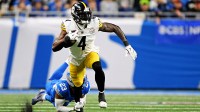 Detroit Lions cornerback Rock Ya-Sin (23) tackles Pittsburgh Steelers wide receiver DK Metcalf (4) during the fourth quarter at Ford Field.