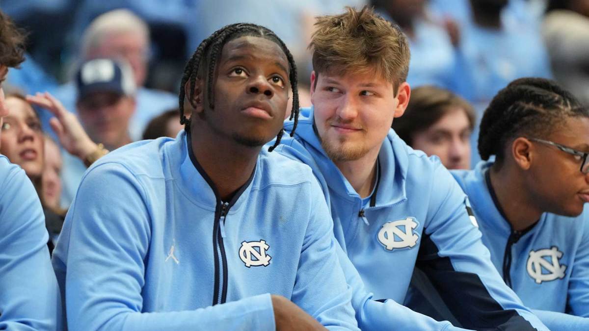 North Carolina Tar Heels forward Caleb Wilson (8) and center Henri Veesaar (13) on the bench in the second half at Dean E. Smith Center.