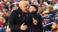 Portland Pilots head coach Shantay Legans talks with his bench during a game against the Gonzaga Bulldogs in the first half at McCarthey Athletic Center.
