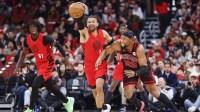 Feb 26, 2026; Chicago, Illinois, USA; Portland Trail Blazers guard Matisse Thybulle (4) tries to keep the ball away from Chicago Bulls forward Guerschon Yabusele (28) during the second half of an NBA game at United Center. Mandatory Credit: Kamil Krzaczynski-Imagn Images