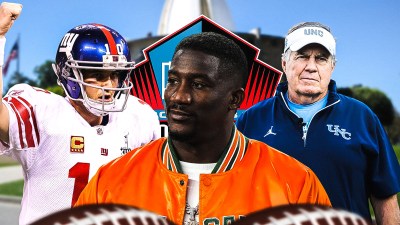 New York Giants players Eli Manning and Pro Bowler Antrel Rolle with Bill Belichick and Pro Football Hall of Fame logo behind them.