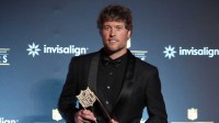 Los Angeles Rams quarterback Matthew Stafford posts with the NFL Honors most valuable player trophy at Palace of Fine Arts.