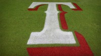 A view of the Texas Rangers logo on the field before the game between the Baltimore Orioles and the Rangers in game three of the ALDS for the 2023 MLB playoffs at Globe Life Field.