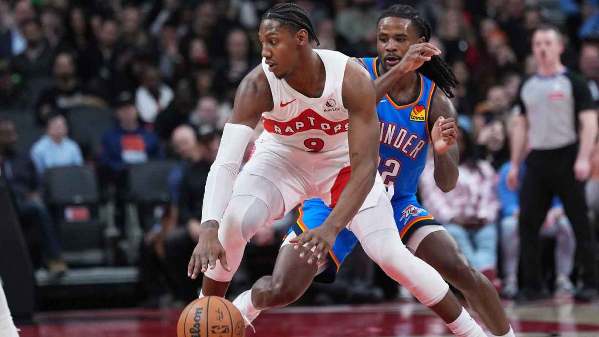 Raptors forward RJ Barrett (9) dribbles against