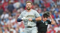 Milwaukee Brewers infielder Rhys Hoskins (12) reacts after striking out against the Philadelphia Phillies in the first inning at Citizens Bank Park