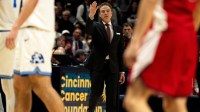 St. Johns Red Storm head coach Rick Pitino coaches in the second half of the NCAA basketball game at the Cintas Center in Cincinnati.