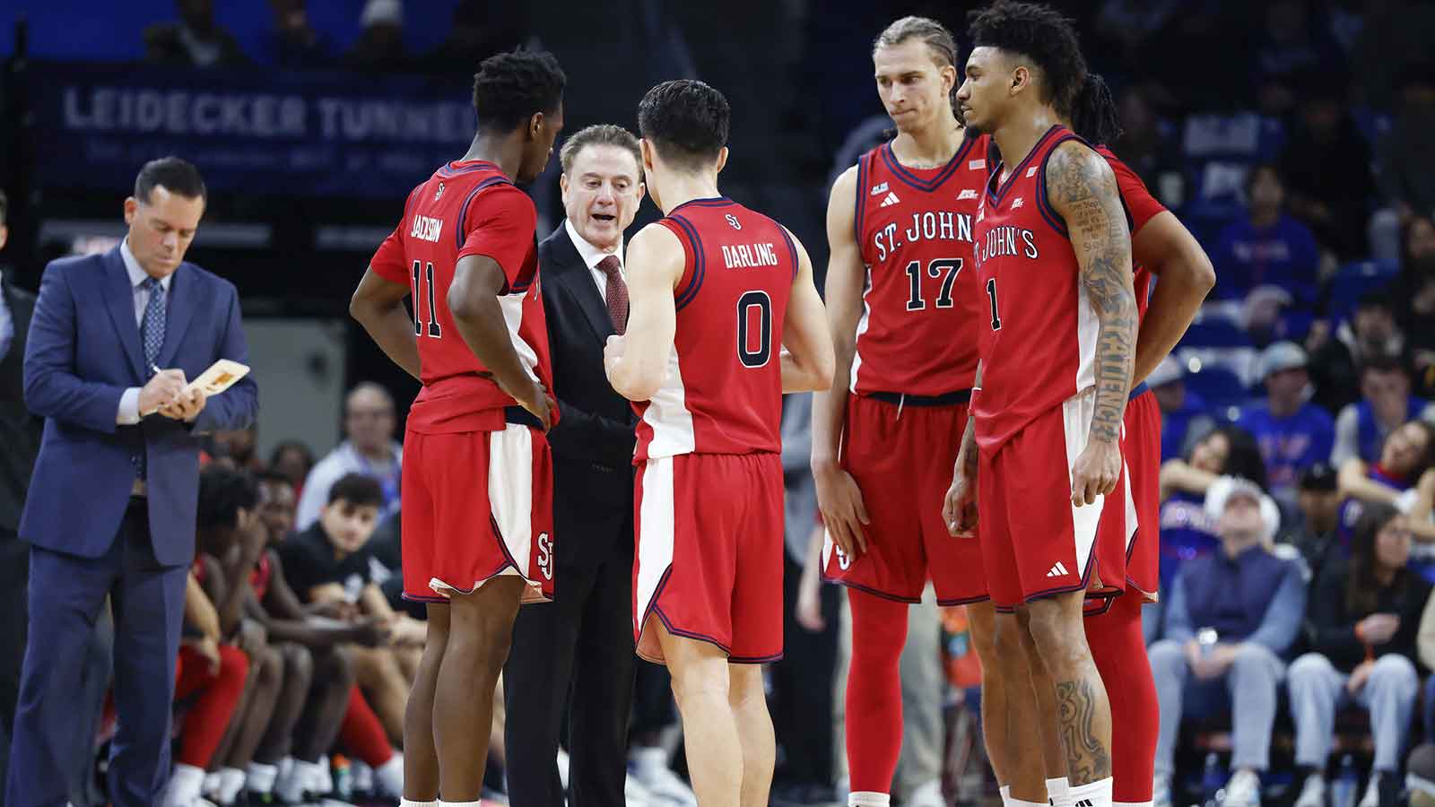 St. John's Red Storm head coach Rick Pitino talks to his players during the second half at Wintrust Arena.