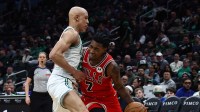 Feb 11, 2026; Boston, Massachusetts, USA; Boston Celtics guard Jordan Walsh (27) tries to cut off Chicago Bulls guard Rob Dillingham (7) during the second half at TD Garden. Mandatory Credit: Winslow Townson-Imagn Images