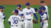 Los Angeles Dodgers manager Dave Roberts (30) pulls Los Angeles Dodgers two-way player Shohei Ohtani (17) from pitching during the seventh inning against the Toronto Blue Jays during game four of the 2025 MLB World Series at Dodger Stadium.