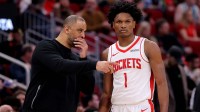 Rockets' Ime Udoka talks with Amen Thompson