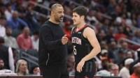 Rockets head coach Ime Udoka reacts with guard Reed Sheppard
