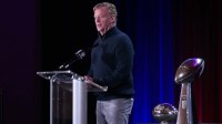 NFL commissioner Roger Goodell speaks flanked by the Vince Lombardi trophy during the Super Bowl LX winning head coach and most valuable player press conference at Moscone Center