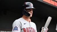 Boston Red Sox outfielder Roman Anthony (19) stands in the dugout before the game between the Baltimore Orioles and the Boston Red Sox at Oriole Park at Camden Yards.
