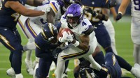 Minnesota Vikings wide receiver Rondale Moore (4) makes a catch against the Los Angeles Chargers during the first half at SoFi Stadium.