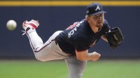 Atlanta Braves pitcher Spencer Schwellenbach (56) delivers a pitch against the Milwaukee Brewers in the first inning at American Family Field.