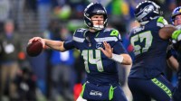 Seattle Seahawks quarterback Sam Darnold (14) passes against the Los Angeles Rams during the second half in the 2026 NFC Championship Game at Lumen Field.