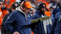 Denver Broncos head coach Sean Payton calls a play during the fourth quarter of an AFC Divisional Round playoff game against the Buffalo Bills at Empower Field at Mile High.
