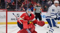 Florida Panthers goaltender Sergei Bobrovsky (72) defends his net from Toronto Maple Leafs center John Tavares (91) during the second period at Amerant Bank Arena.