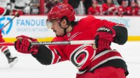 Carolina Hurricanes center Seth Jarvis (24) takes a shot against the Los Angeles Kings during the third period at Lenovo Center.