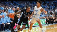 Duke Blue Devils guard Isaiah Evans (3) with the ball as North Carolina Tar Heels guard Seth Trimble (7) defends in the first half at Dean E. Smith Center.
