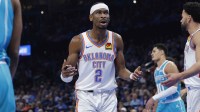 Oklahoma City Thunder guard Shai Gilgeous-Alexander (2) reacts after an official call following a play against the Charlotte Hornets during the second