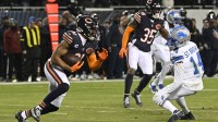Chicago Bears safety Kevin Byard III (31) runs with the ball after making an interception against the Detroit Lions during the second half at Soldier Field.