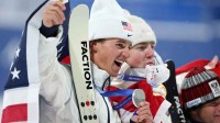Feb 17, 2026; Livigno, Italy; Silver medalist Mac Forehand of the United States celebrates during the medal ceremony for the men's big air final during the Milano Cortina 2026 Olympic Winter Games at Livigno Snow Park. Mandatory Credit: Nathan Ray Seebeck-Imagn Images