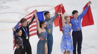 Feb 11, 2026; Milan, Italy; Silver medalists Madison Chock and Evan Bates of the United States, gold medalists Laurence Fournier Beaudry and Guillaume Cizeron of France, and bronze medalists Piper Gilles and Paul Poirier of Canada pose after receiving their medals during the Milano Cortina 2026 Olympic Winter Games at Milano Ice Skating Arena. Mandatory Credit: Amber Searls-Imagn Images