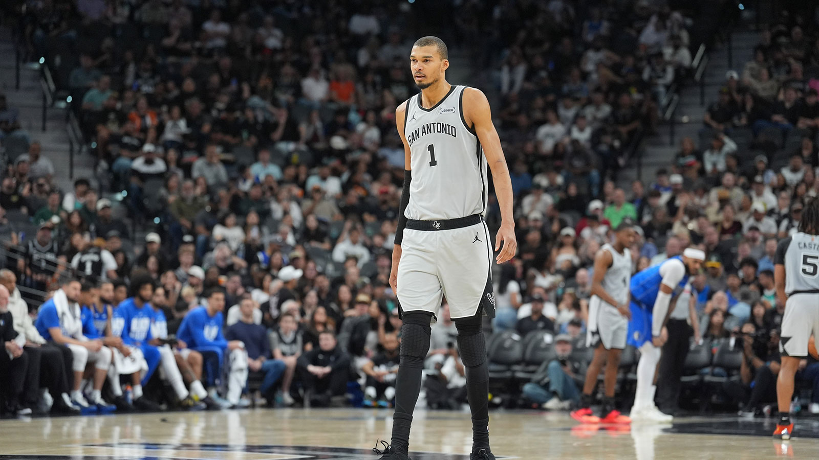 San Antonio Spurs forward Victor Wembanyama (1) walks up the court in the second half against the Dallas Mavericks at Frost Bank Center.