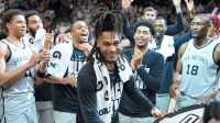 San Antonio Spurs guard Stephon Castle (5) beats the drum after the game against the Dallas Mavericks at Frost Bank Center.