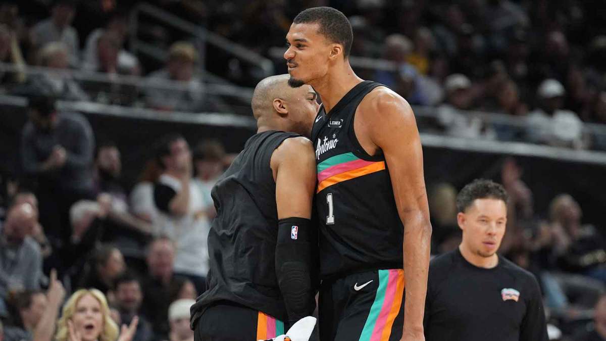 San Antonio Spurs forwards Keldon Johnson (3) and forward Victor Wembanyama (1) celebrate in the second half against the Sacramento Kings at Moody Center.